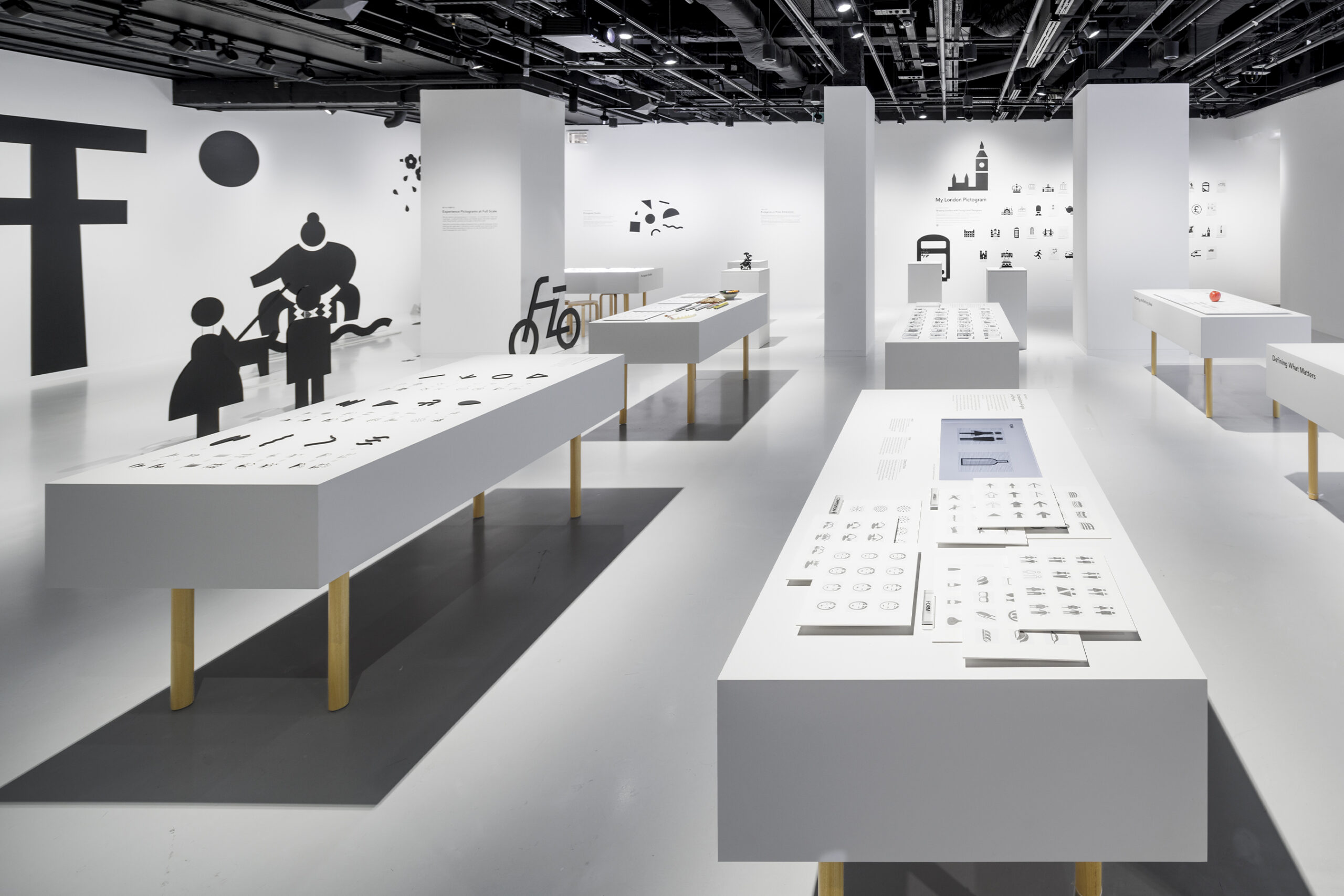 Panoramic interior image showing multiple sections of the Pictograms exhibition.