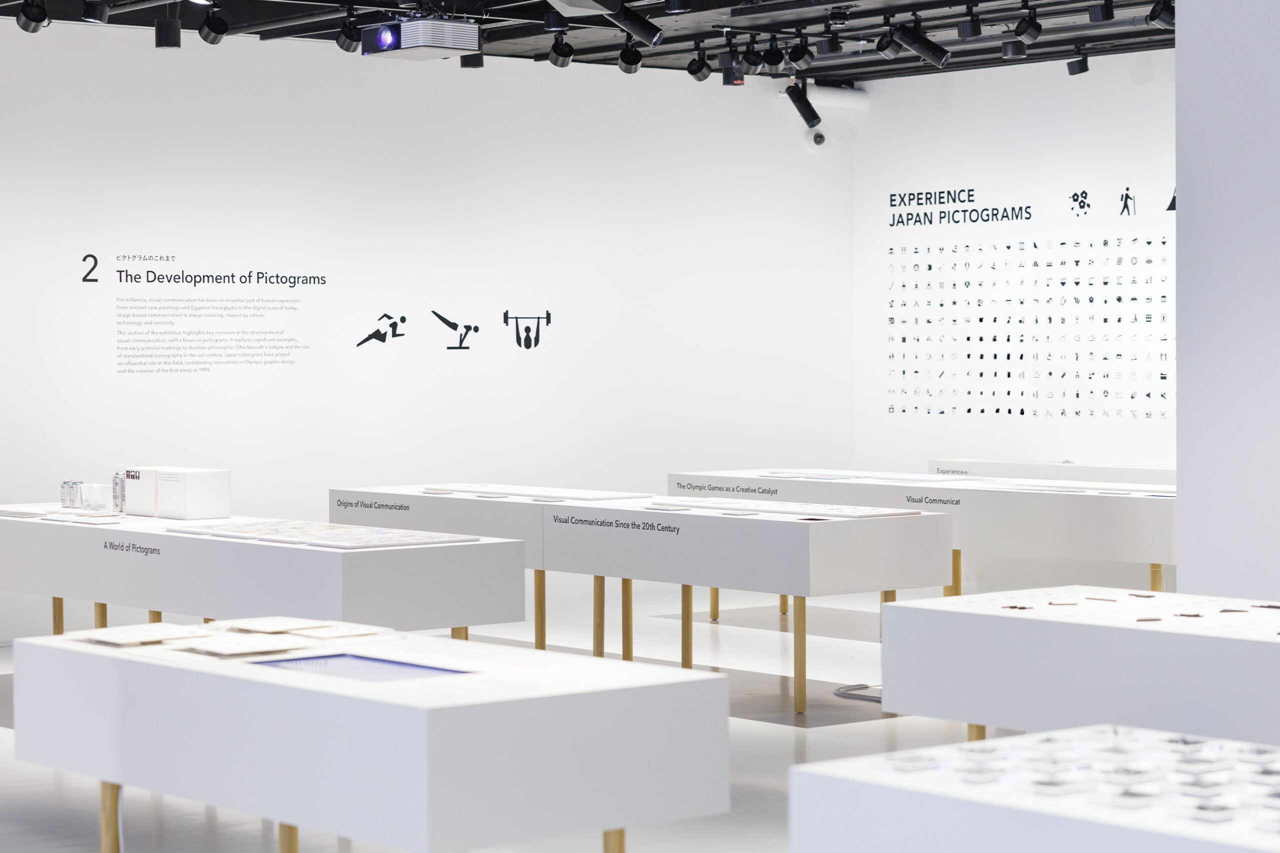 Display featuring the 1964 Tokyo Olympics pictograms that influenced global design standards.