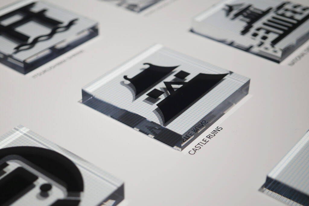 Display presenting a castle-themed pictogram inspired by Japanese architecture.