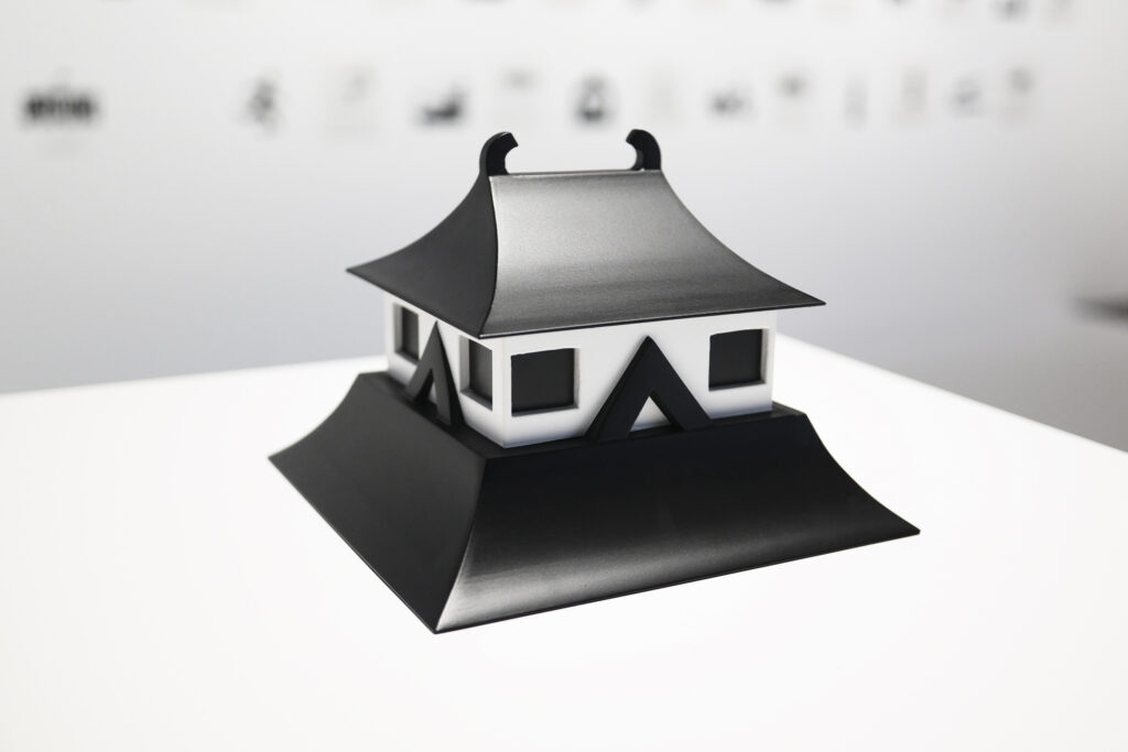 Three-dimensional pictogram representing a Japanese castle.